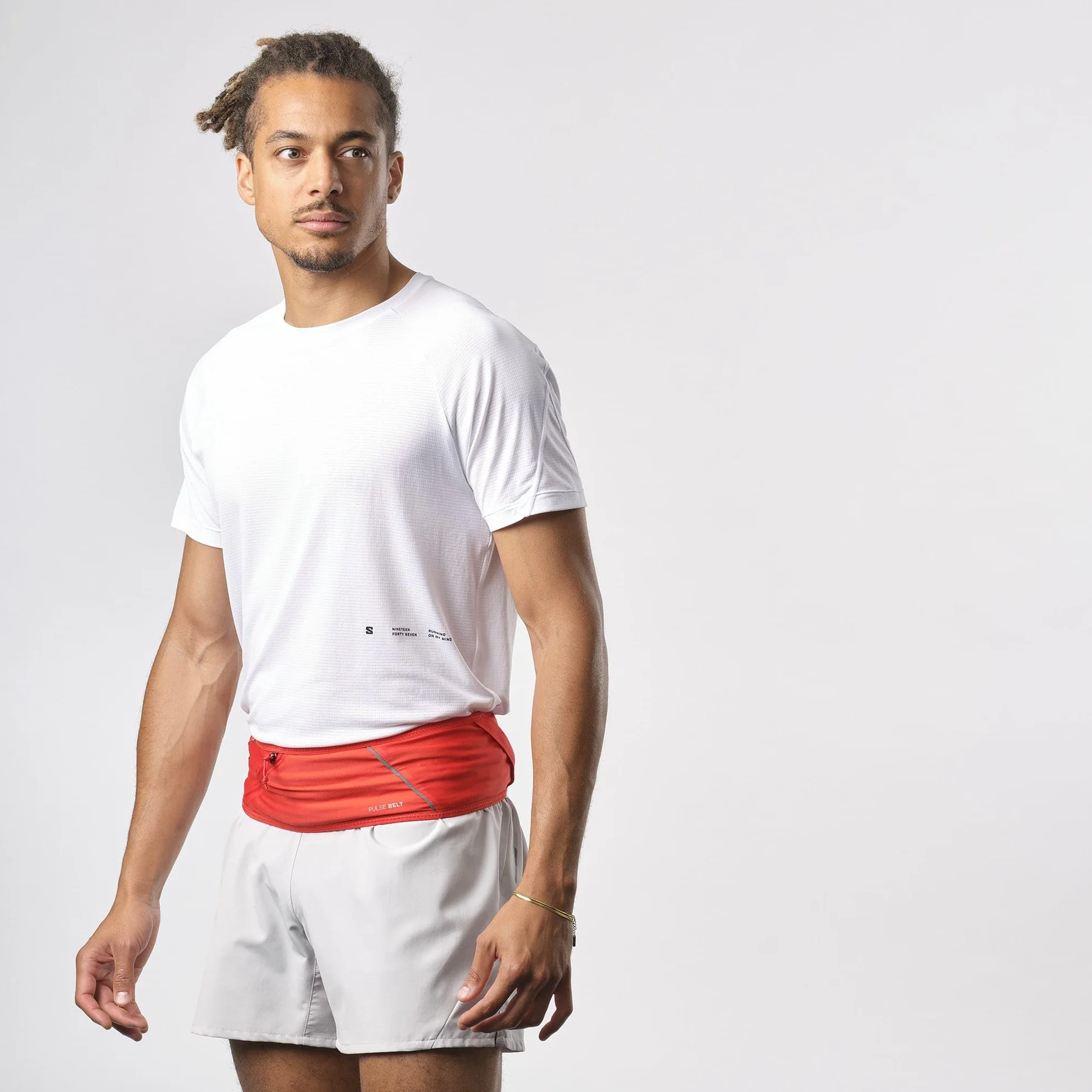 Salomon Pulse Ceinture de Course légère et ajustée en Tissu Respirant, Poches sécurisées et Design Minimaliste, Parfaite pour Les Courses Courtes ou Techniques