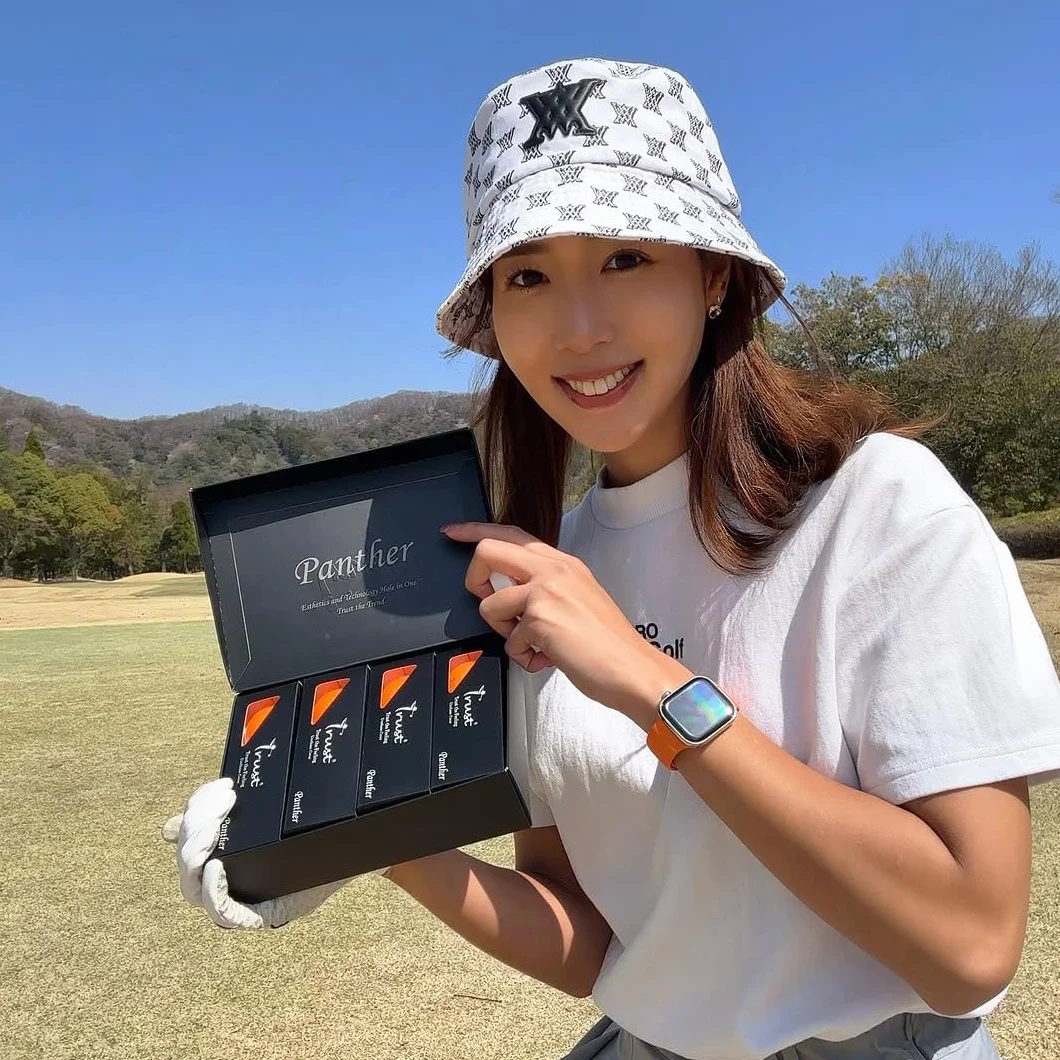 Trust Balles de Golf Panther | pour Passer sous Les 100 | Revêtement Uréthane pour Un Toucher Ultra-Doux | Noyau Big Max pour Une Distance Maximale et Un Vol Précis (12/48 Balles, Blanc/Jaune/Orange)